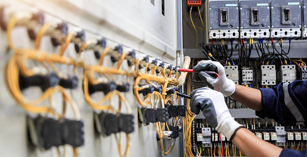 Professional Electrician technician working in East Marion, NY